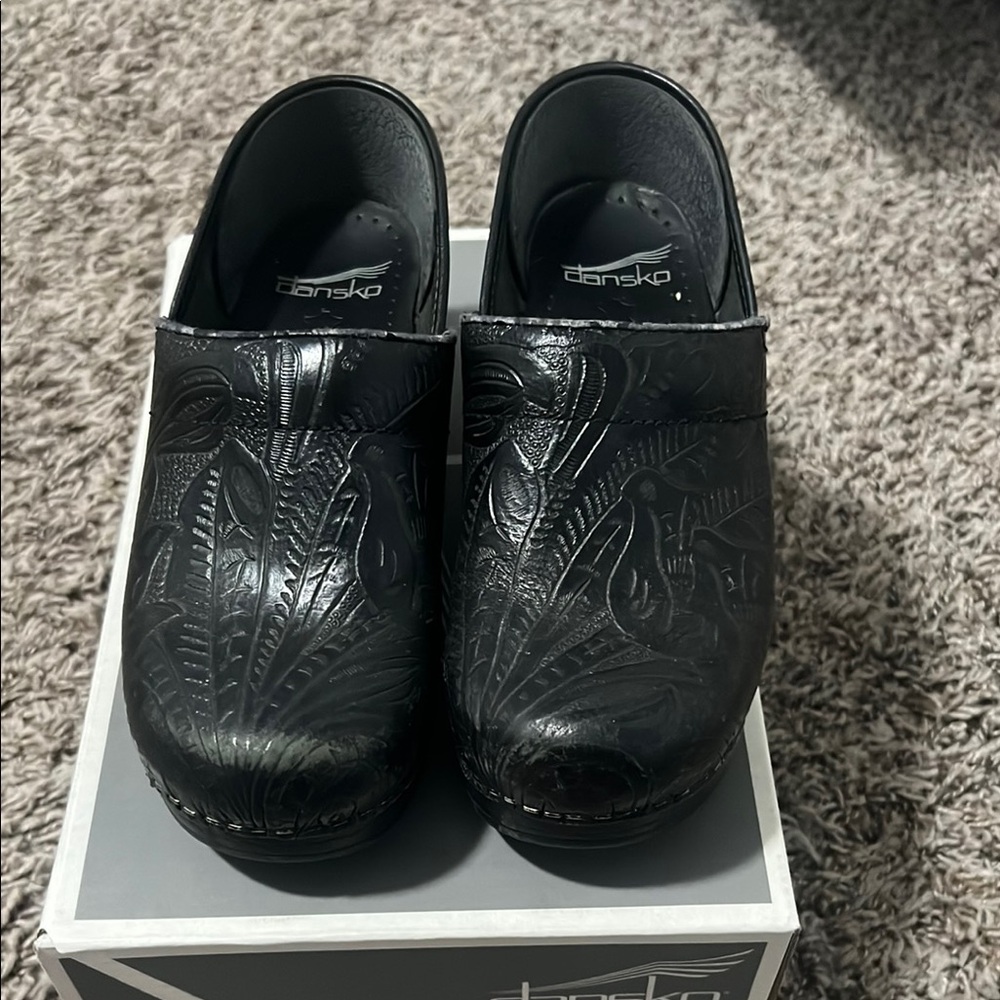 Dansko Embossed Black Leather Clogs